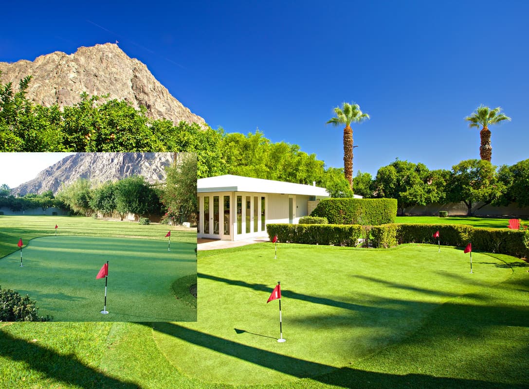 Putting green, lawn and pale pavilion below mountains